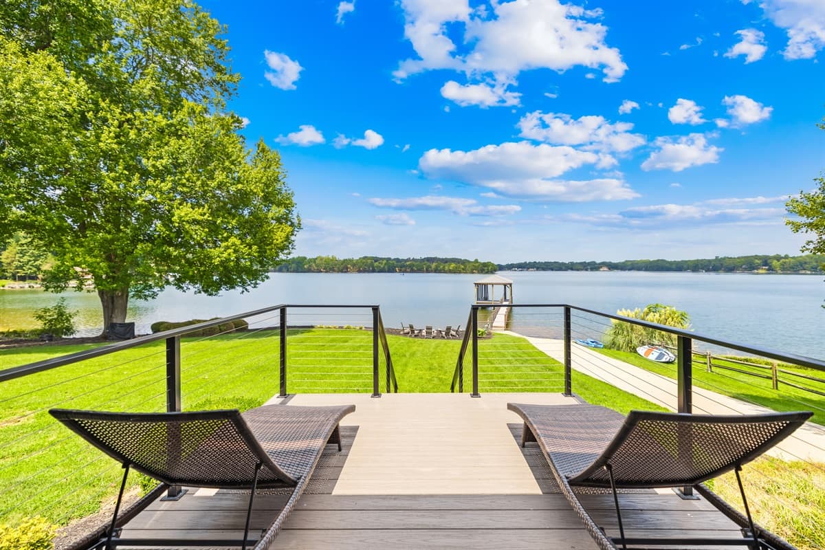 Relax on the back patio surrounded by the stunning view of Lake Norman!