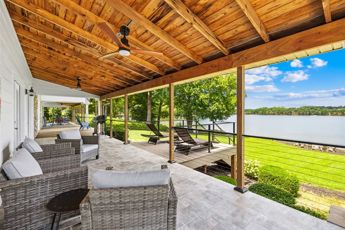Covered back patio to enjoy some rest and relaxation lake side. 