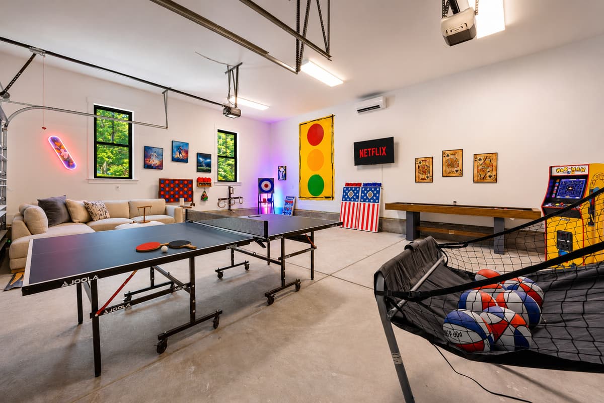 Rainy day or game night, this vibrant arcade and ping pong room keeps the whole crew entertained for hours.