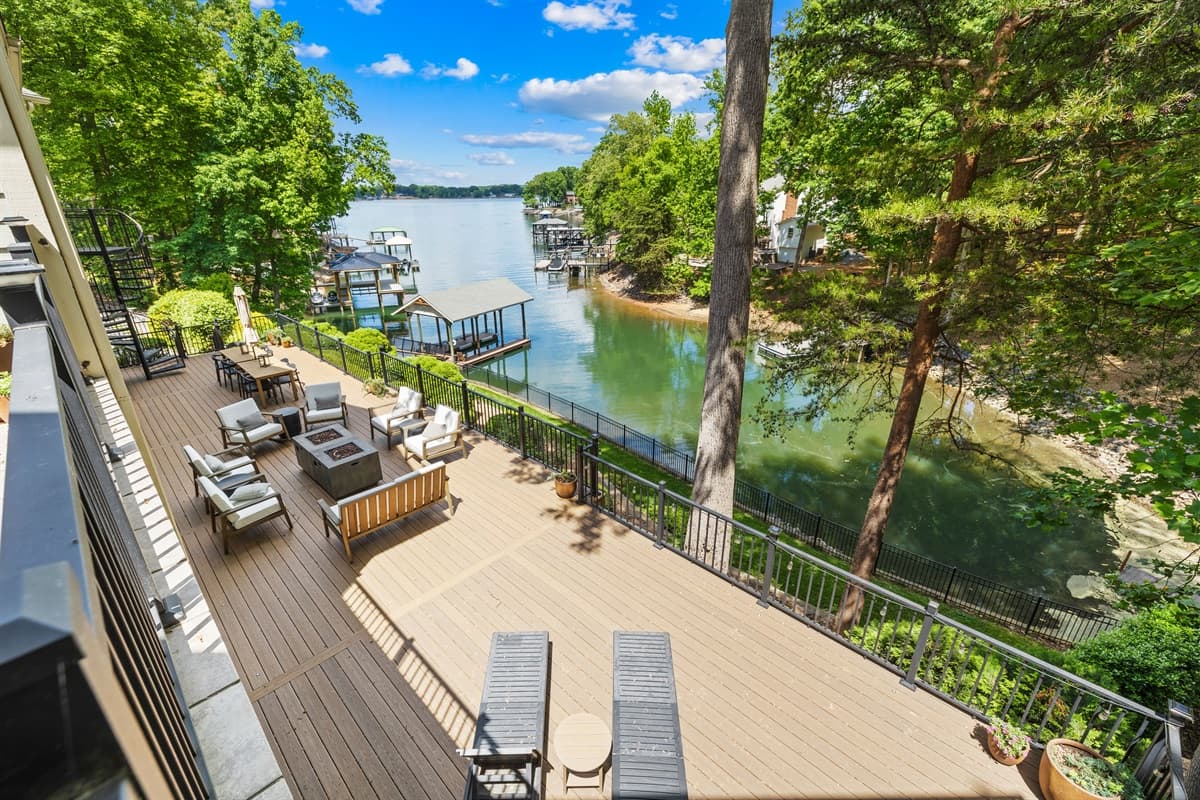 Take in the lake from the multi-level deck, complete with cozy seating and a view straight down to the private dock.