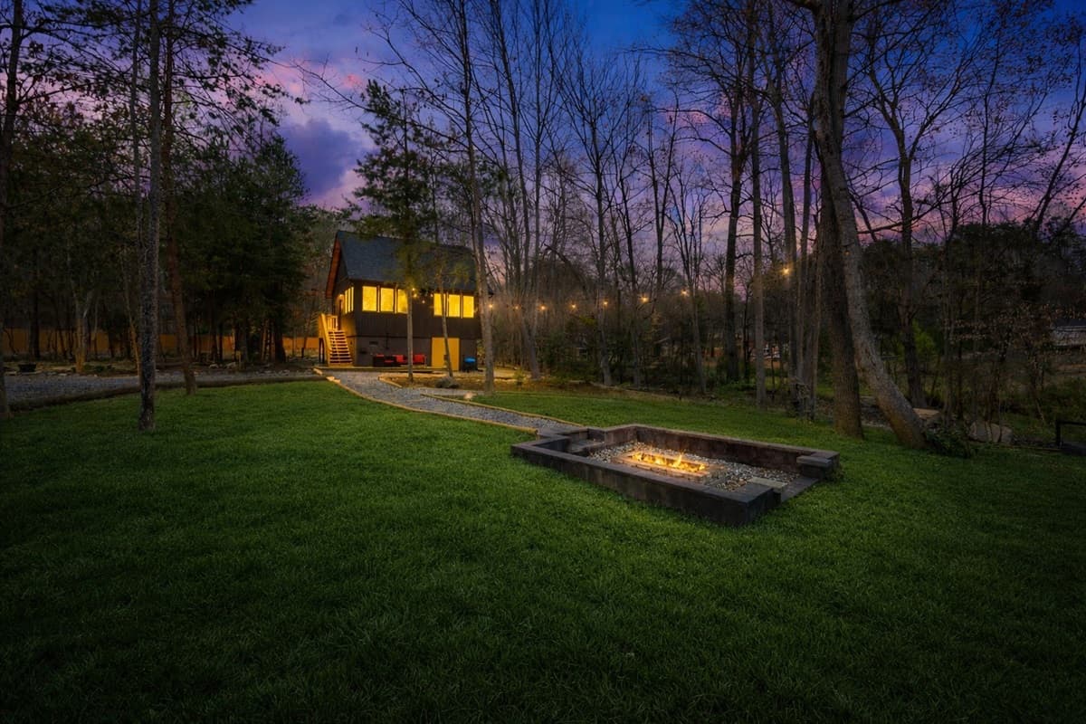 Feel the warmth of our built-in firepit, perfect for cozy evenings under the stars.