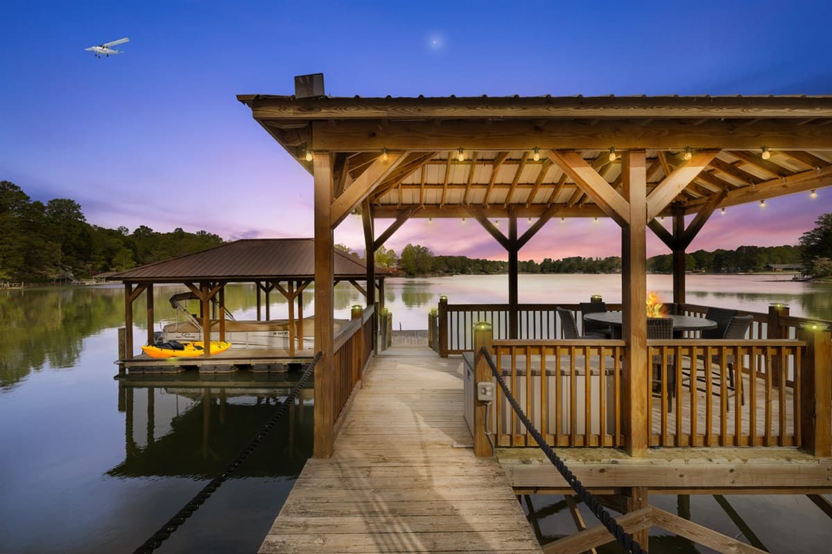 Twilight views from the covered dock — the perfect spot to watch the sky turn shades of purple and gold.
